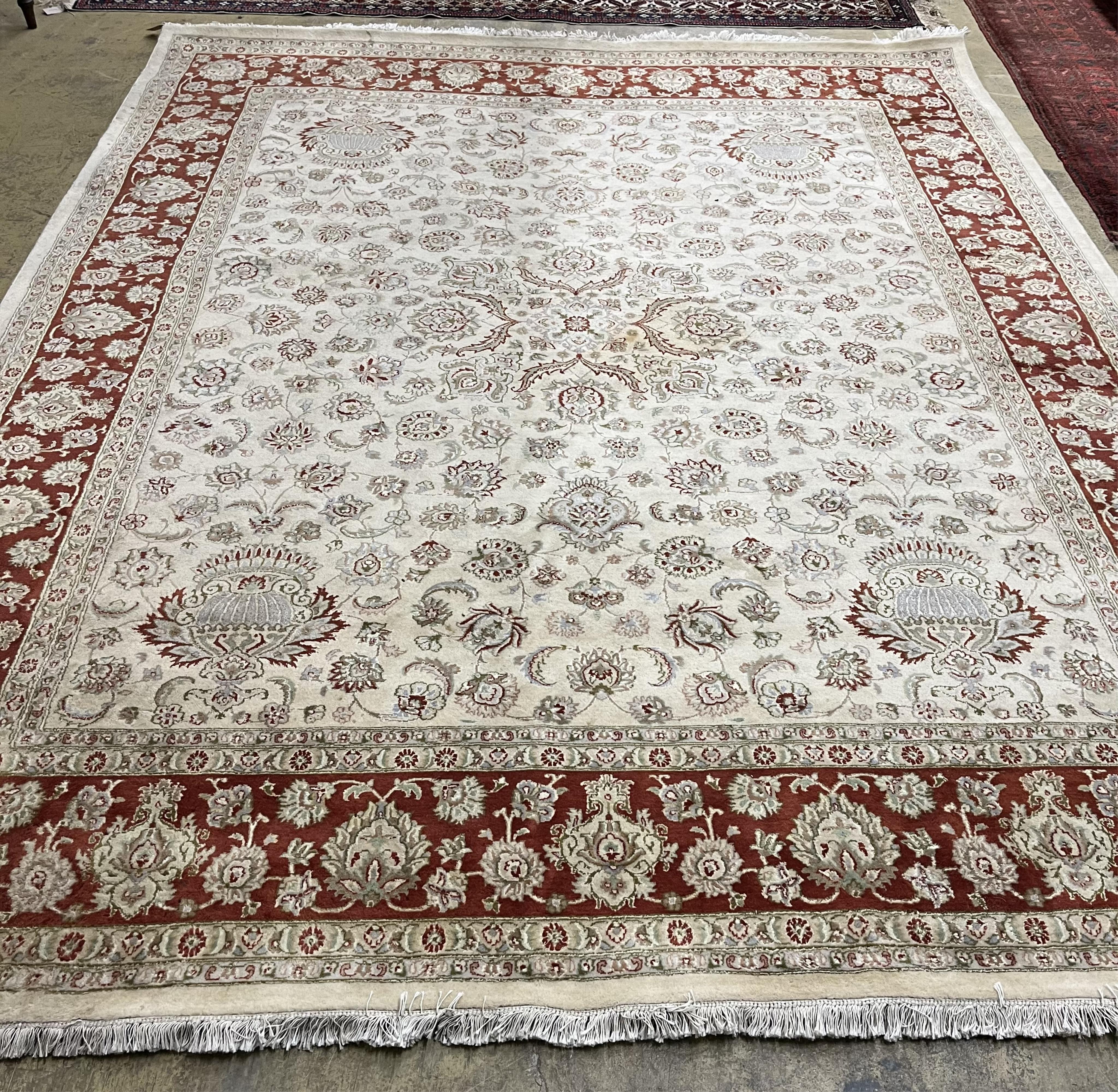 A Ziegler style ivory ground carpet, 320 x 274cm. Condition - fair to good